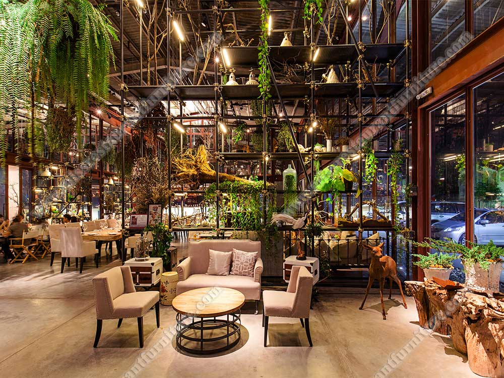 Tailand Bangkok Vivarium restaurant furniture_round wood restaurant table and nails decor fabric sofas